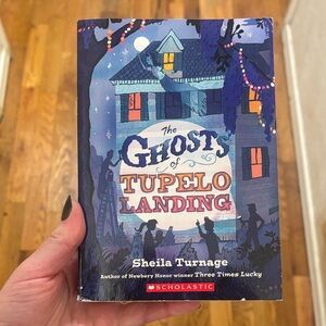 Scholastic's The Ghosts of Tupelo Landing - Blue and Purple Cover